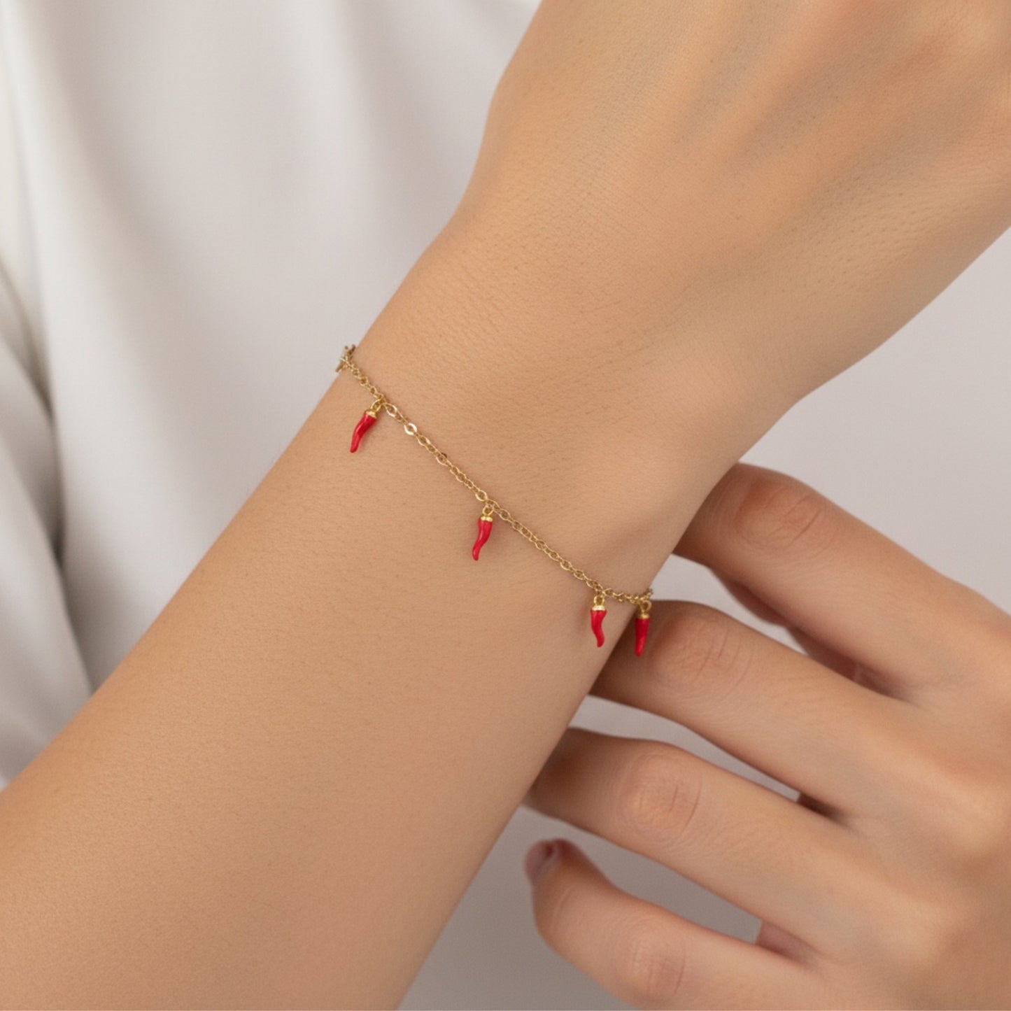 BRACCIALE / CAVIGLIERA CORNETTO PORTAFORTUNA