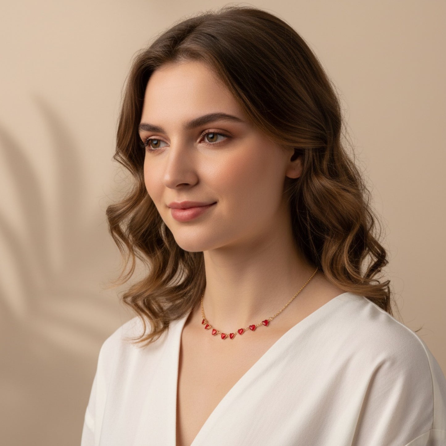 COLLANA CON CUORI ROSSI
